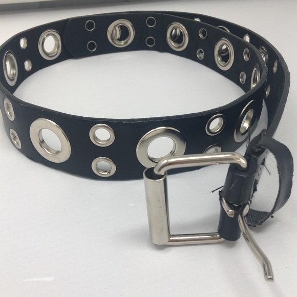 black leather belt with silver holes